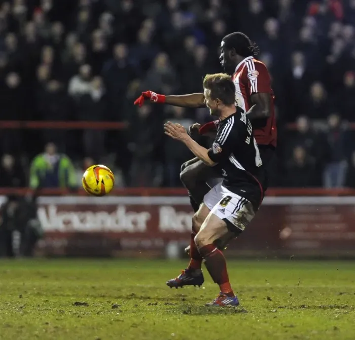 Framed Print : Wade Elliott vs. Clayton Donaldson: Intense Battle at Griffin Park, Brentford v Bristol City, Sky Bet League One Framed Print : Wade Elliott vs. Clayton Donaldson: Intense Battle at Griffin Park, Brentford v Bristol City, Sky Bet League One