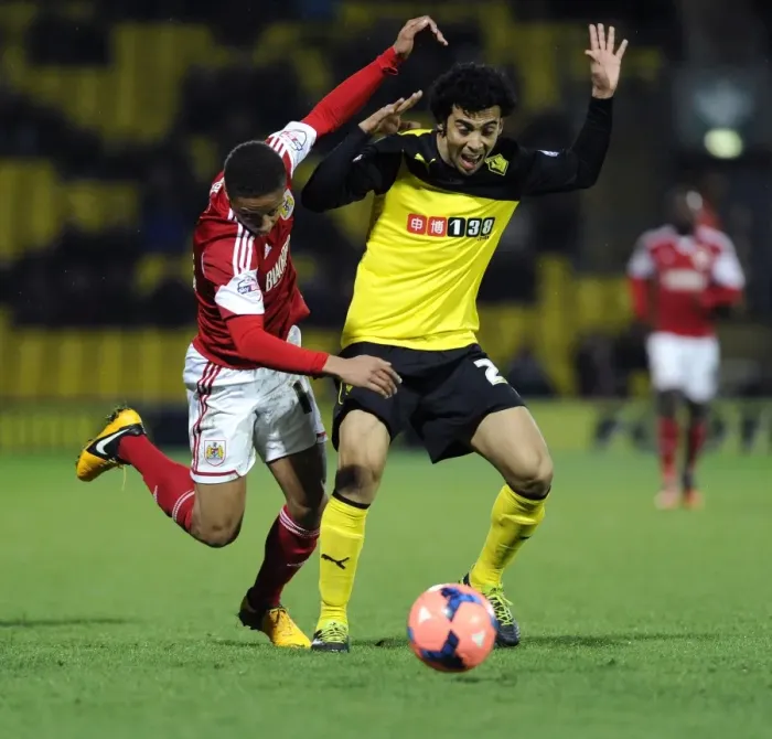 Framed Print : Watford's Iriney Fouls Bobby Reid in FA Cup Third Round Replay: Watford v Bristol City (14 / 01 / 2014)