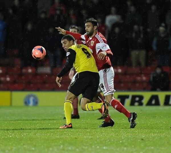 Watford's Troy Deeney Holds Off Bristol City's Liam Fontaine in FA Cup Third Round Replay