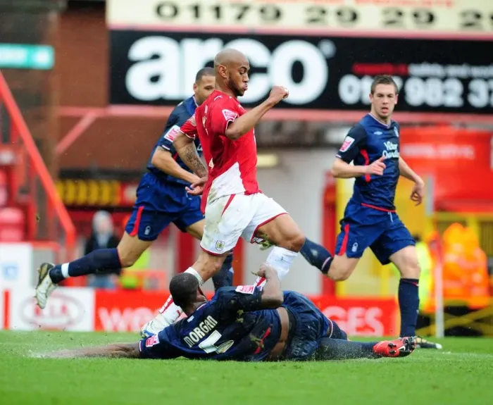 Framed Print : Wes Morgan Stops Danny Haynes: Intense Moment from the 2010 Championship Clash between Bristol City and Nottingham Forest Framed Print : Wes Morgan Stops Danny Haynes: Intense Moment from the 2010 Championship Clash between Bristol City and Nottingham Forest