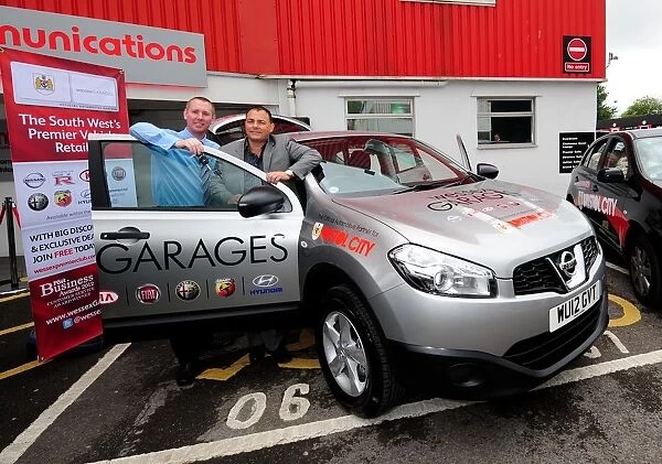Wessex Garages Officially Hands Over New Media Car to Bristol City FC's Adam Baker