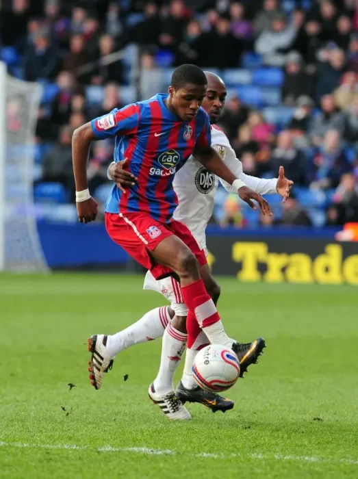 Framed Print : Wilfried Zaha vs. Jamal Campbell-Ryce: Battle for the Ball in Championship Clash between Crystal Palace and Bristol City (22 / 01 / 2011) Framed Print : Wilfried Zaha vs. Jamal Campbell-Ryce: Battle for the Ball in Championship Clash between Crystal Palace and Bristol City (22 / 01 / 2011)
