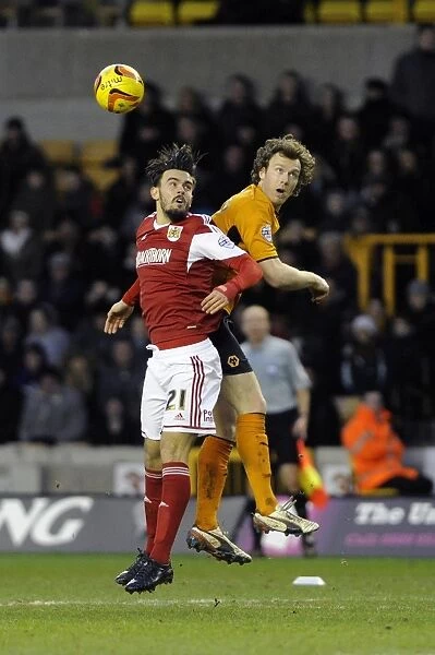 Wolverhampton Wanderers vs. Bristol City: Intense Aerial Battle Between Kevin McDonald and Marlon Pack