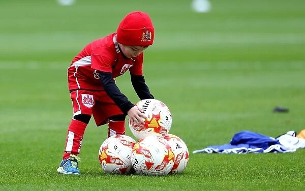 Young Bristol City Fan Helps Out at Barnsley's Oakwell Stadium during Match