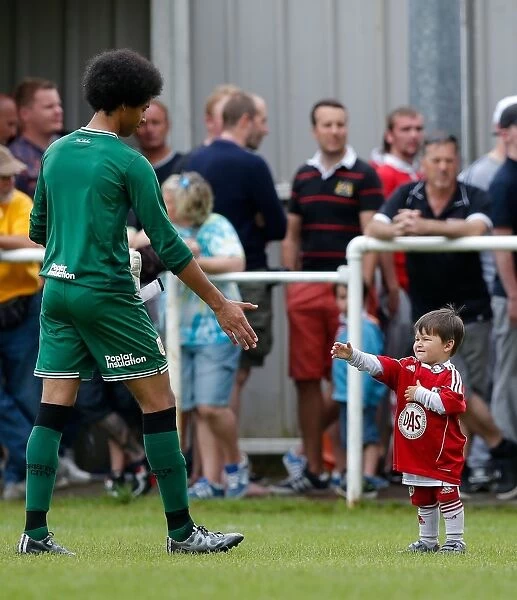 Young Fan Meets Goalkeeper Jojo Wollacott after Bristol City's Preseason Community Match