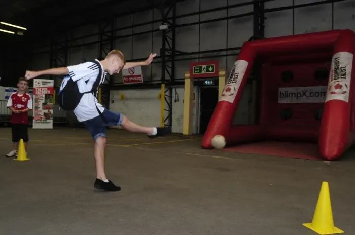 Framed Print : Young Fan Takes Aim at Ashton Gate: Bristol City vs. Bradford City, 2013