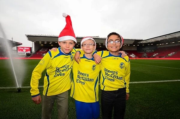 Young Fans in Christmas Hats at Bristol City vs. Preston North End Match, 2016
