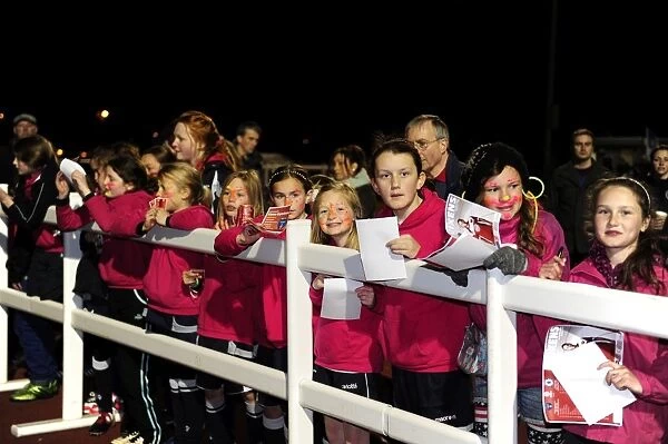 Young Fans Eagerly Await Players Signatures at Bristol Academy vs. Chelsea Ladies Match