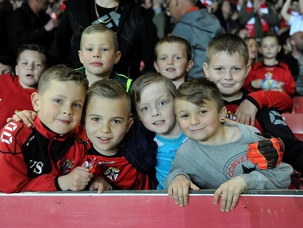 Young Fans Excitement at Bristol City vs. Swindon Town Football Match, April 2015