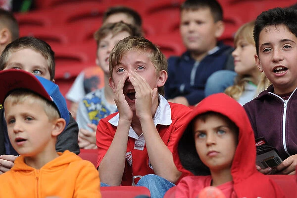 A Young Fan's Hopeful Gaze: Bristol City vs MK Dons, 2015