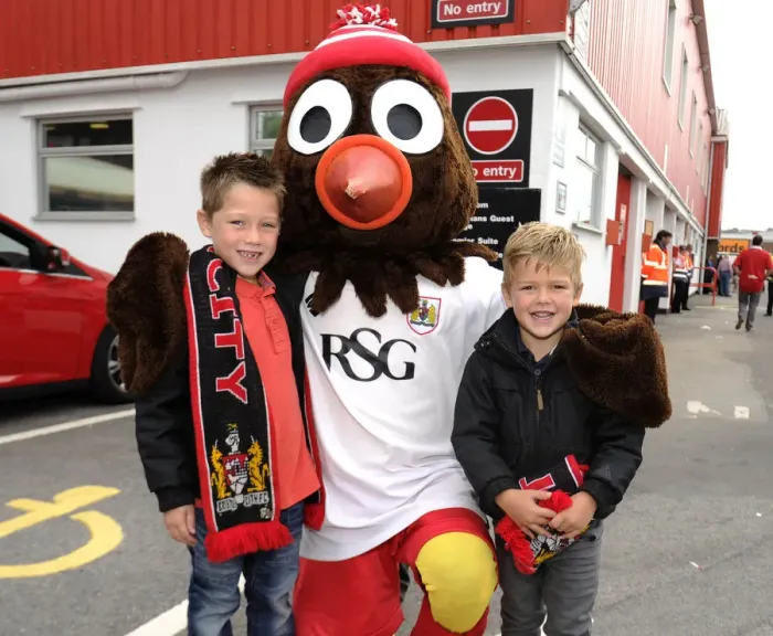 Framed Print : Young Fans Meet Scrumpy, the Bristol City Mascot at Ashton Gate Framed Print : Young Fans Meet Scrumpy, the Bristol City Mascot at Ashton Gate