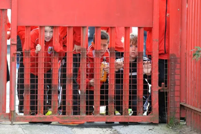 Framed Print : Young Fans Peek at Bristol City vs Oldham Athletic Football Match, 2014 Framed Print : Young Fans Peek at Bristol City vs Oldham Athletic Football Match, 2014