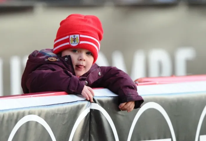 Framed Print : Young Fan's Thrill at FA Cup Match: Bristol City vs AFC Telford United