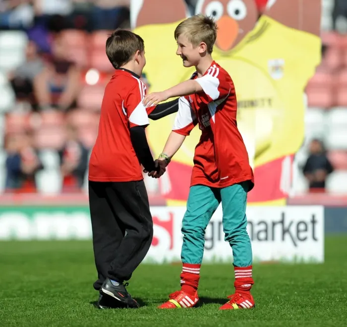 Framed Print : Young Rivals Leo Worlock and Luca Fortuna: Celebrating Bristol City's Victory with Unmatched Camaraderie