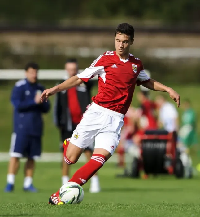 Framed Print : Young Star Aron Davies Dazzles in Bristol City U18's Win Against Brighton & Hove Albion