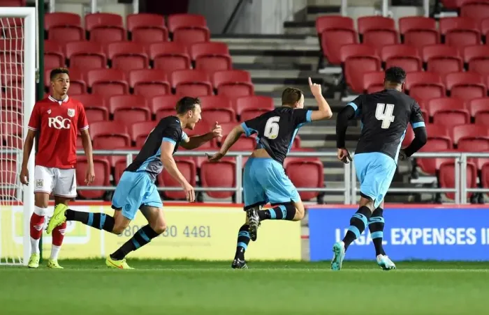 Framed Print : Young Striker's Thrilling Goal: Bristol City U21 vs Sheffield Wednesday U21, Ashton Gate Stadium