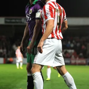 Aaron Wilbraham and Matt Taylor Clash in Intense Rivalry: Cheltenham Town vs. Bristol City, 08/10/2014