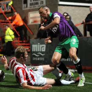 Aaron Wilbraham vs Jack Deaman: Intense Battle in Cheltenham Town vs Bristol City Football Match, October 2014