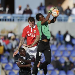 Aden Flint of Bristol City in Action Against Extension Gunners in Botswana, 2014 Aden Flint of Bristol City in Action Against Extension Gunners in Botswana, 2014