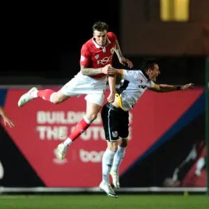 Print of Aden Flint in mid-air, battling for the high ball Print of Aden Flint in mid-air, battling for the high ball