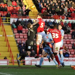 Bristol City FC Print: Aden Flint Heads the Ball