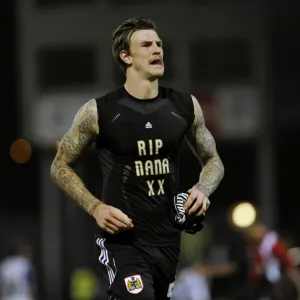 Aden Flint Honors Nana with RIP Shirt during Tranmere vs. Bristol City Match (November 2013) Aden Flint Honors Nana with RIP Shirt during Tranmere vs. Bristol City Match (November 2013)