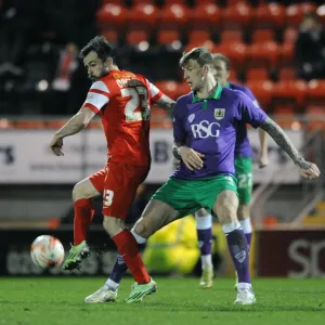 Aden Flint vs. Chris Dagnall: Intense Battle for the Ball in Leyton Orient vs. Bristol City Football Match, Sky Bet League One Aden Flint vs. Chris Dagnall: Intense Battle for the Ball in Leyton Orient vs. Bristol City Football Match, Sky Bet League One