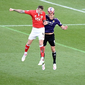 Aden Flint Wins High Ball Over Andy Carroll: Bristol City vs West Ham United, FA Cup Fourth Round