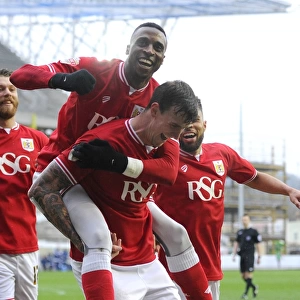 Aden Flint's Double Delight: Celebrating His First Goal Against Ipswich Town with Team Mates