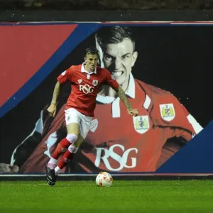 Aden Flint's Pride: Bristol City Footballer Stands Tall Against Leyton Orient in 2014