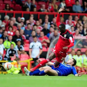 Adomah vs Mutch: Intense Battle at Ashton Gate, Bristol City vs Cardiff City, Championship Football, 2012 Adomah vs Mutch: Intense Battle at Ashton Gate, Bristol City vs Cardiff City, Championship Football, 2012