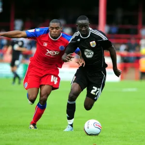 Adomah vs. Panther: Intense Battle for Ball Possession (Aldershot vs. Bristol City) Adomah vs. Panther: Intense Battle for Ball Possession (Aldershot vs. Bristol City)