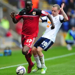 Adomah vs Spearing: Intense Battle for Ball Possession in Bolton Wanderers vs Bristol City Championship Clash Adomah vs Spearing: Intense Battle for Ball Possession in Bolton Wanderers vs Bristol City Championship Clash