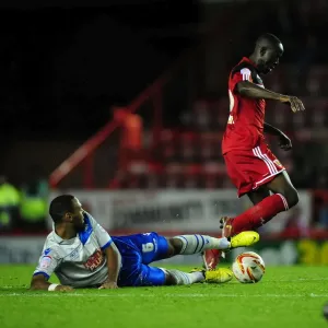 Print of Albert Adomah vs Liam Trotter in Championship Football Match
