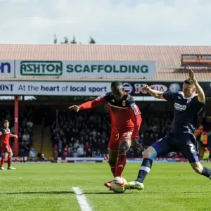 Adomah vs. Woods: Intense Championship Showdown at Ashton Gate
