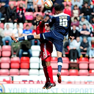 Aerial Clash: Marvin Elliott vs. Oscar Gobern, Bristol City vs. Huddersfield Town, Npower Championship
