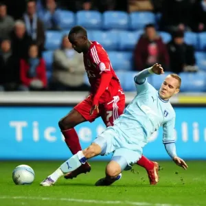 Albert Adomah Drives Past Coventry Defense: Coventry City vs. Bristol City, Championship Football Match, December 2011 Albert Adomah Drives Past Coventry Defense: Coventry City vs. Bristol City, Championship Football Match, December 2011