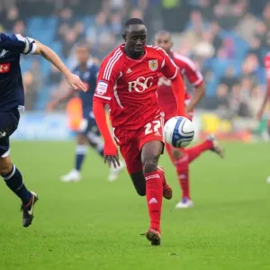 Albert Adomah Slips Past Paul Robinson: Millwall vs. Bristol City Championship Clash (November 2011) Albert Adomah Slips Past Paul Robinson: Millwall vs. Bristol City Championship Clash (November 2011)