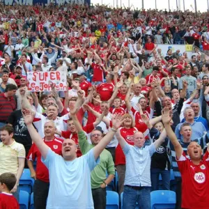 the away fans celibrate in style
