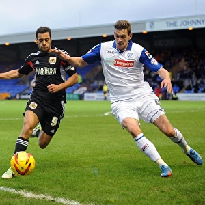 Baldock and Taylor in Pursuit: Intense Action from Tranmere vs. Bristol City, League One Football Match