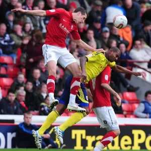 Barnsley vs. Bristol City: Intense Battle for the High Ball in Championship Match, October 2011