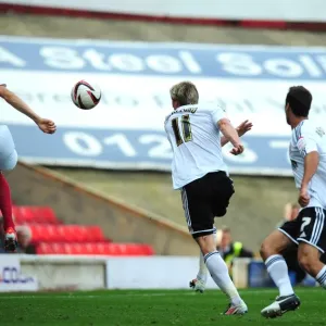 Print of John Stones blocking Martyn Woolford's shot at Oakwell Stadium