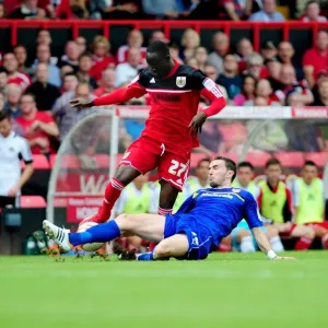 A Battle for Possession: Mutch vs. Adomah in the Championship Clash at Ashton Gate A Battle for Possession: Mutch vs. Adomah in the Championship Clash at Ashton Gate