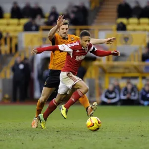 Battleground Molineux: McDonald vs. Reid - A Football Rivalry Unfolds (Wolves vs. Bristol City)