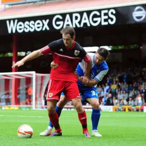 Battling for the Ball: Brett Pitman vs. Jim Paterson - Bristol City vs. Bristol Rovers, 2012 (Louis Carey Testimonial)