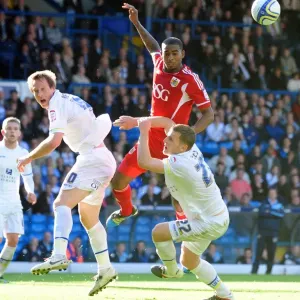 Battling for Control: Elliott vs. Becchio and Somma in the Intense 2011 League Cup Clash between Leeds United and Bristol City Battling for Control: Elliott vs. Becchio and Somma in the Intense 2011 League Cup Clash between Leeds United and Bristol City