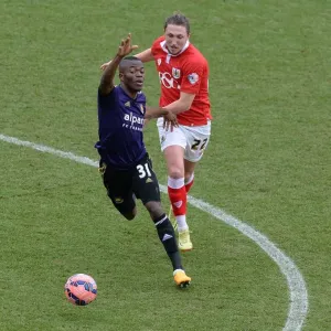 Print of Luke Ayling battling Enner Valencia in FA Cup action