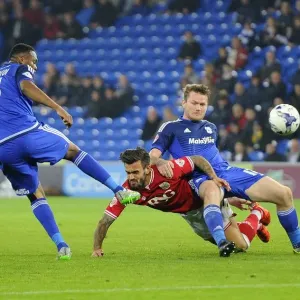 Battling Midfielders: Gunnarsson vs. Pack in Cardiff City vs. Bristol City Championship Clash