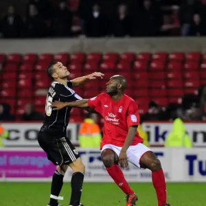 Battling for Supremacy: Adebola vs. Caulker in Forest vs. Bristol City Championship Clash