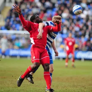Battling for Supremacy: Akinde vs. Gunnarsson in the Championship Clash between Reading and Bristol City (13/03/2010) Battling for Supremacy: Akinde vs. Gunnarsson in the Championship Clash between Reading and Bristol City (13/03/2010)